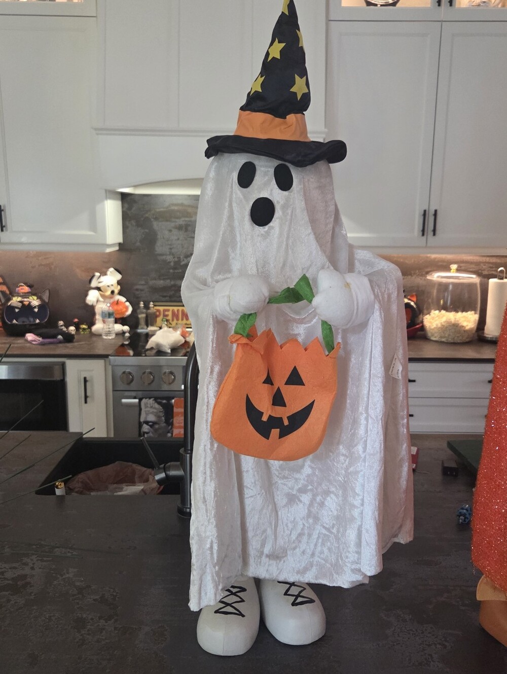 White Ghost Trick-or-Treatwith Orange Pumpkin Bag. Home Devor